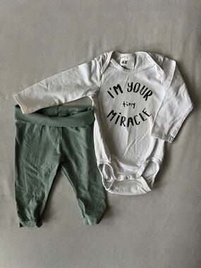 H&M White Bodysuit with Black Text & Sage Green Pants